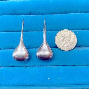 Costume jewelry silver earrings